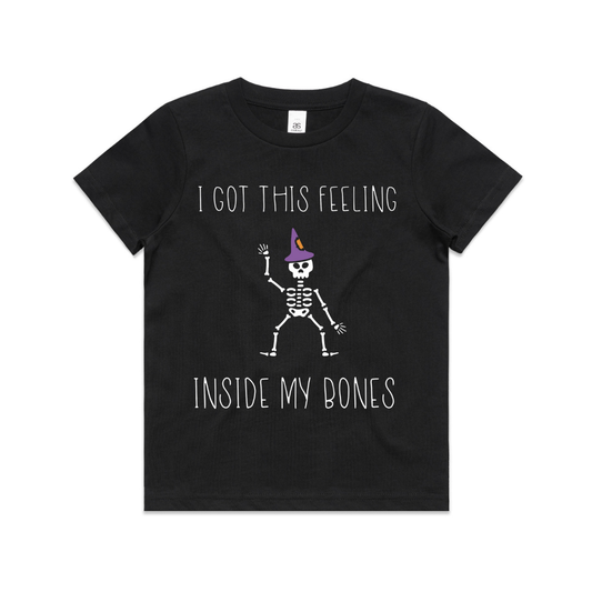 Black T-Shirt with a white skeleton wearing a purple and orange witch's hat. T-shirt says I got this feeling inside my bones.
